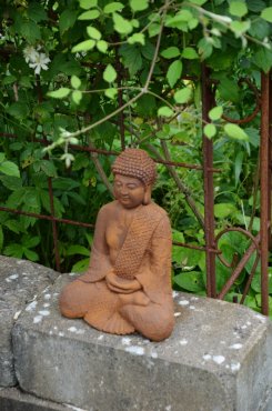Buddha, sittande