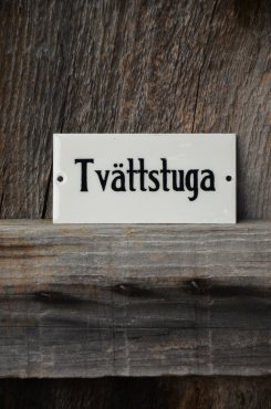 Emaljskylt Tvttstuga