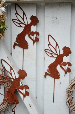lva, Bernice, som plockar blommar