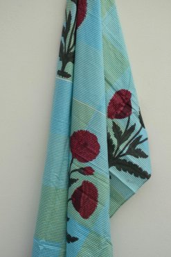 Sarong, "Blommor p� turkos botten"