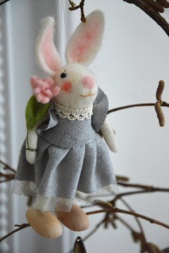 Kanin ulldjur vit med blomma