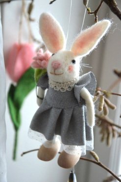 Kanin ulldjur vit med blomma